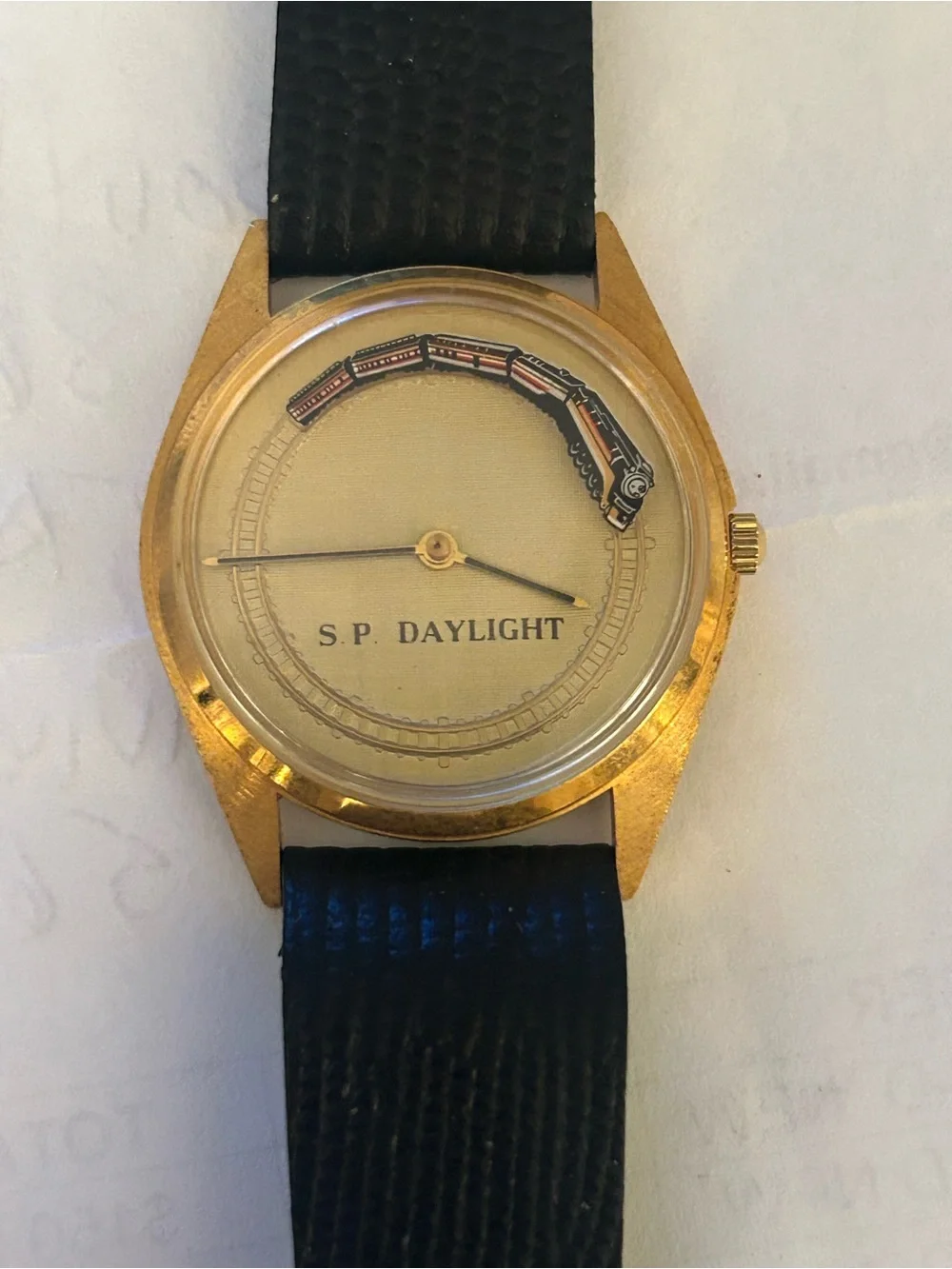 S.P. Daylight Men's Gold Watch w Moving Train Black Leather Band. New battery